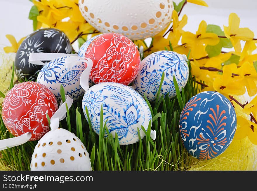 Hand painted czech easter eggs in fresh green grass