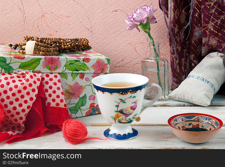 The still-life with morning tea and flower