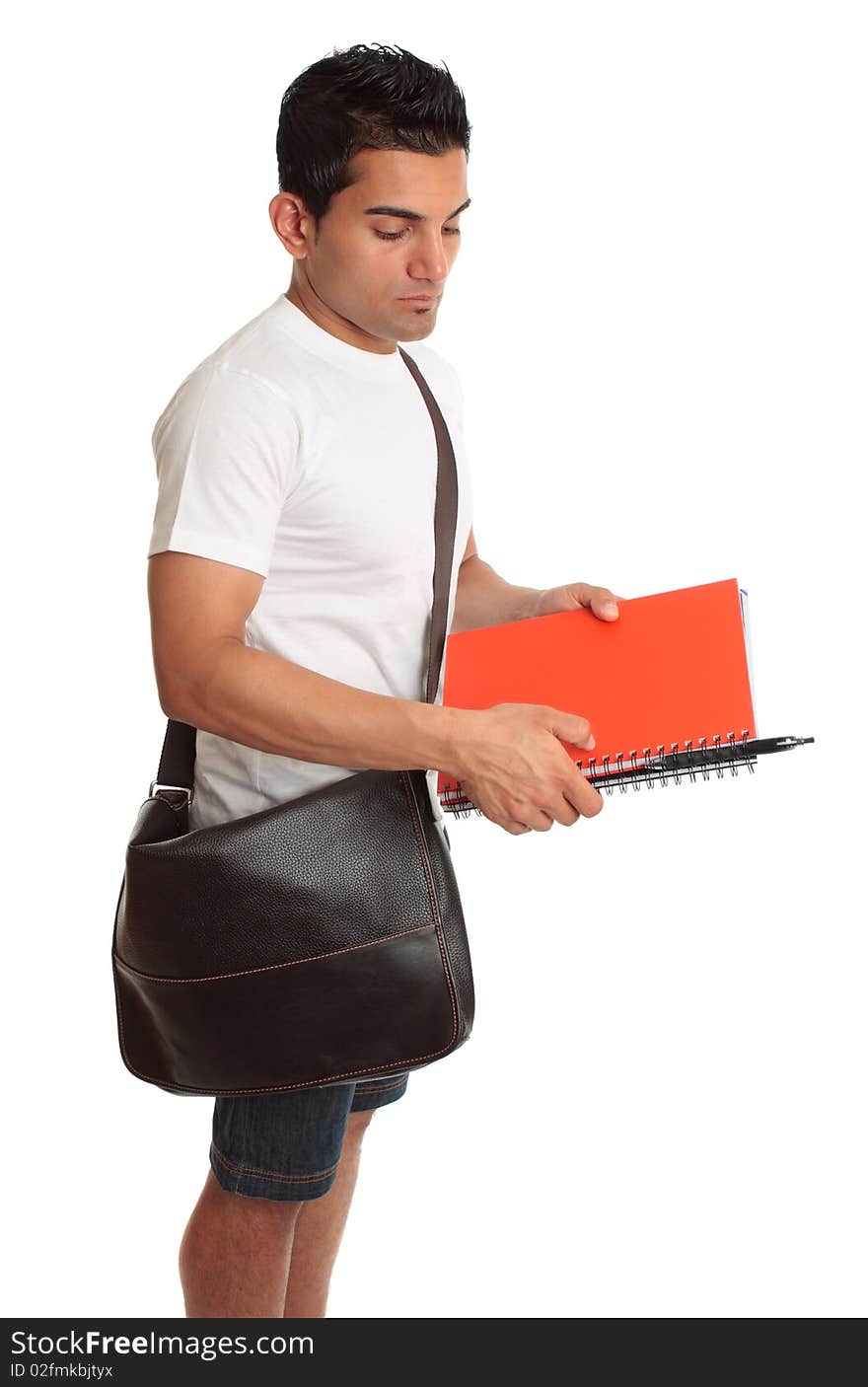 A college or university student with brown bag and books