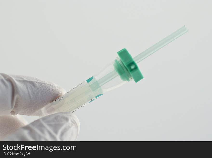 A test tube for capillary blood sample. The green colour means you get plasma.