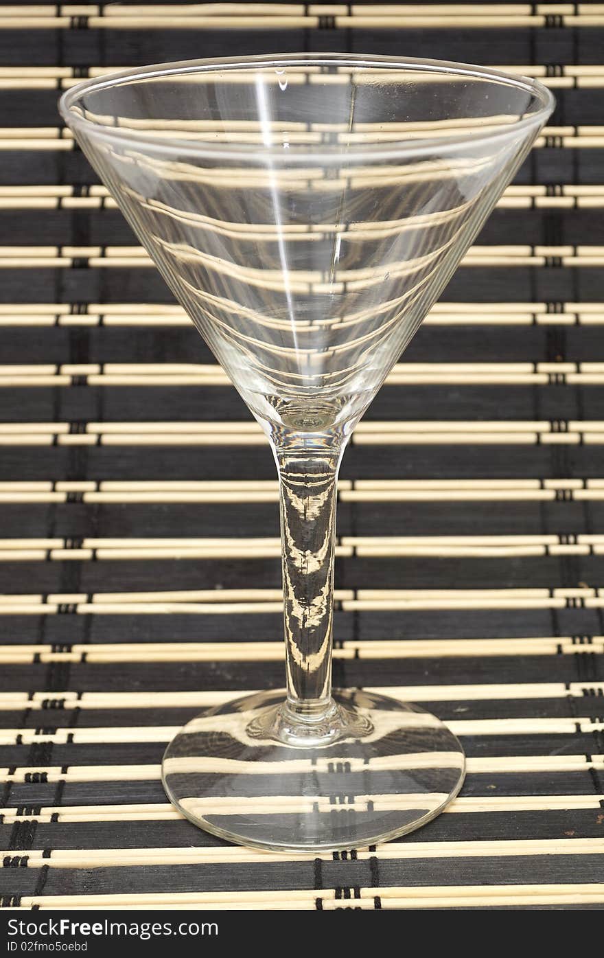 Martini glass on striped cloth