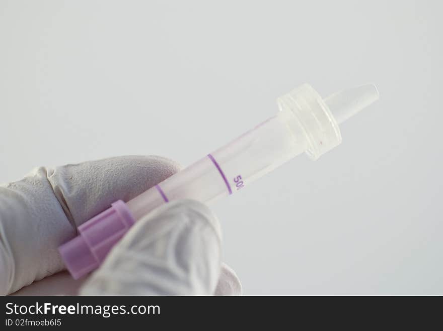 A test tube for capillary blood sample. The purple colour means you get plasma.