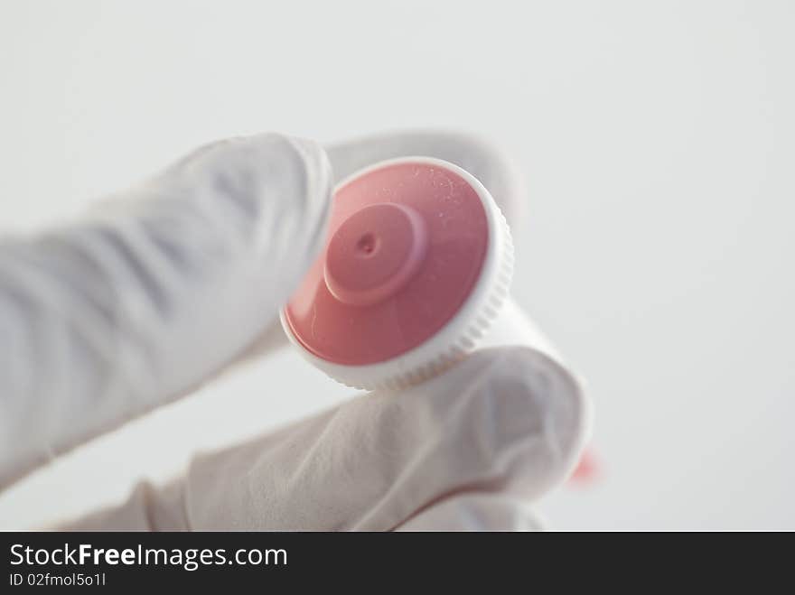 A capillary needle for blood samples in the finger. The pink colour means it is a size for children.