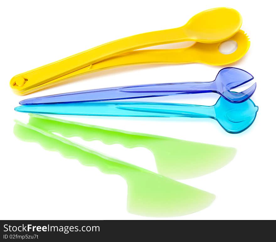 Colour plastic dishes, fork, spoon, knife