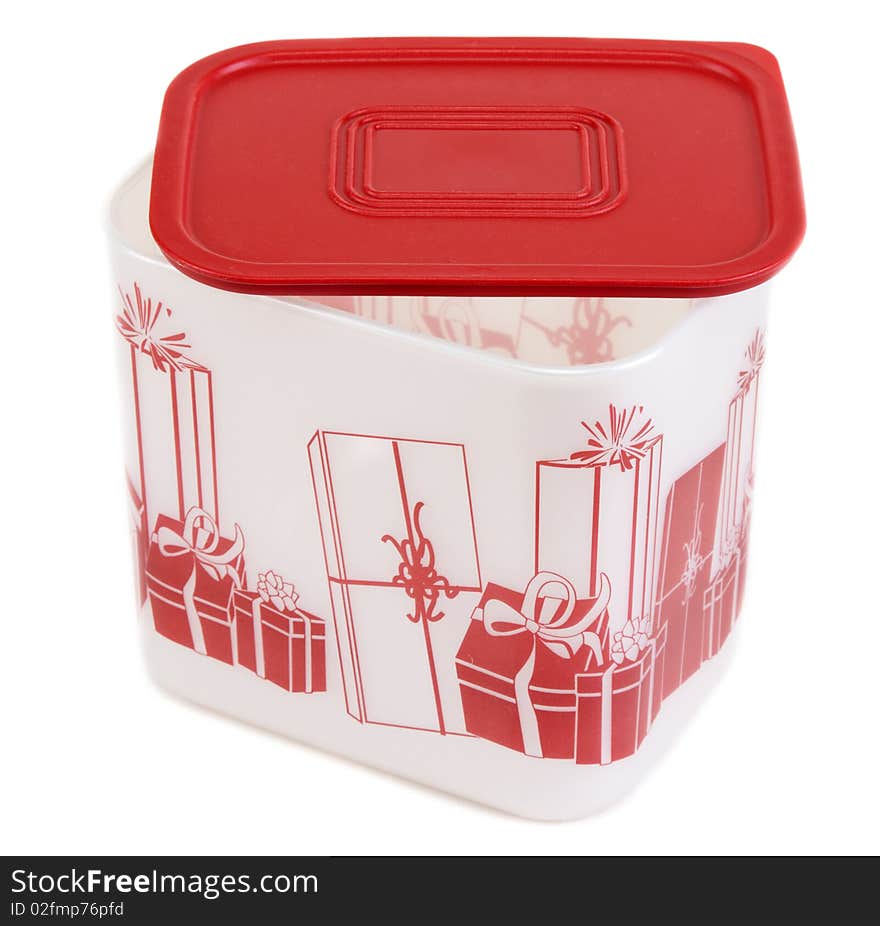 Plastic container with red lid and pattern on white background