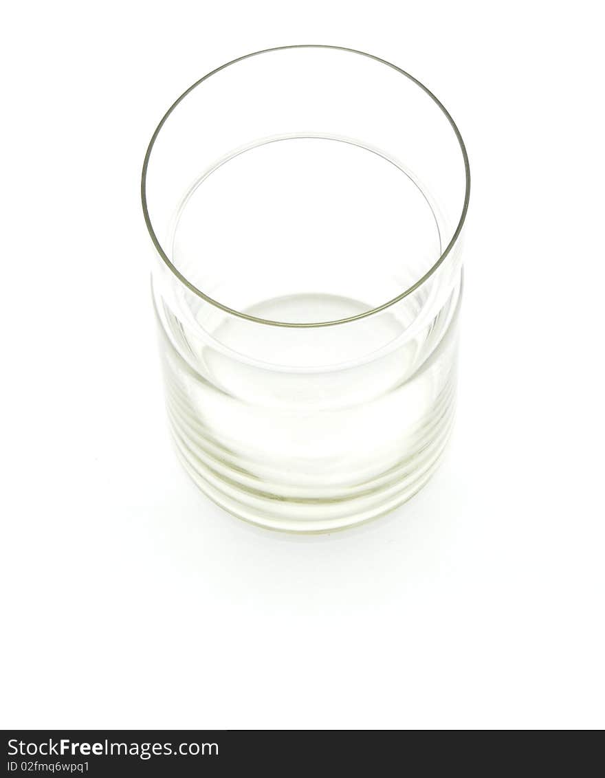 Glass tumbler, on a white background