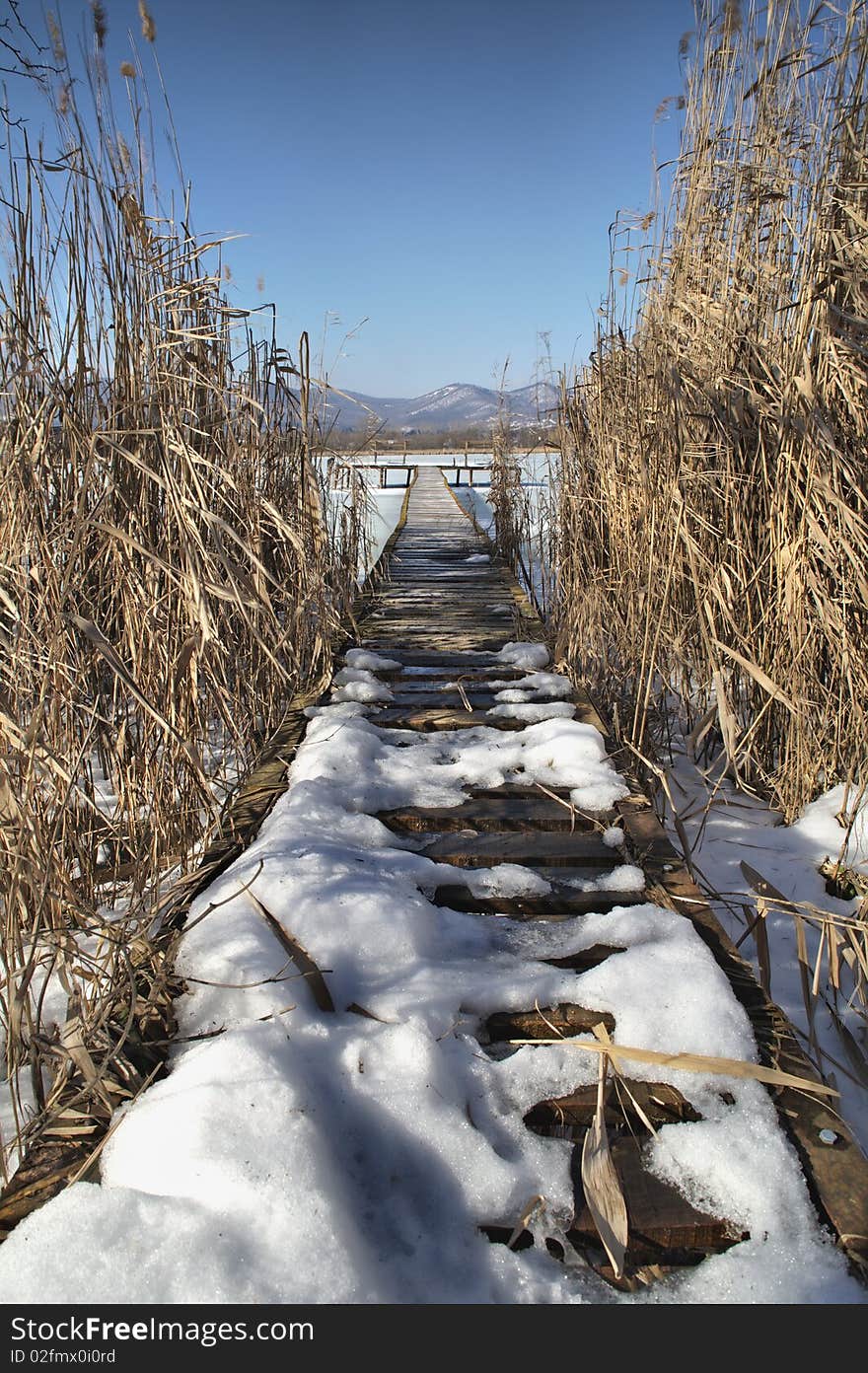 Pier wintertime on the lake, high density range image. Pier wintertime on the lake, high density range image