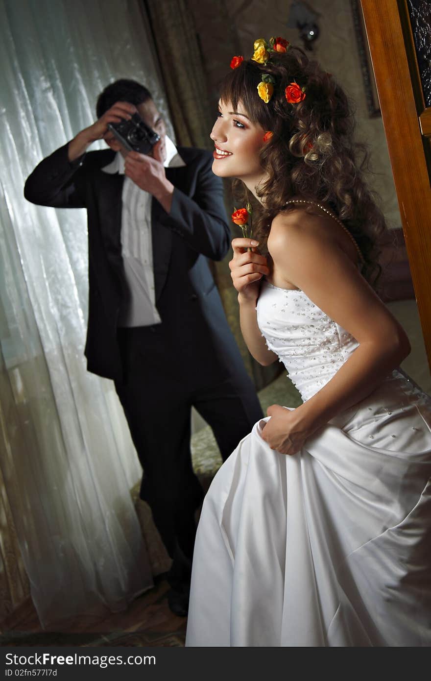 Newly married taking a photograph