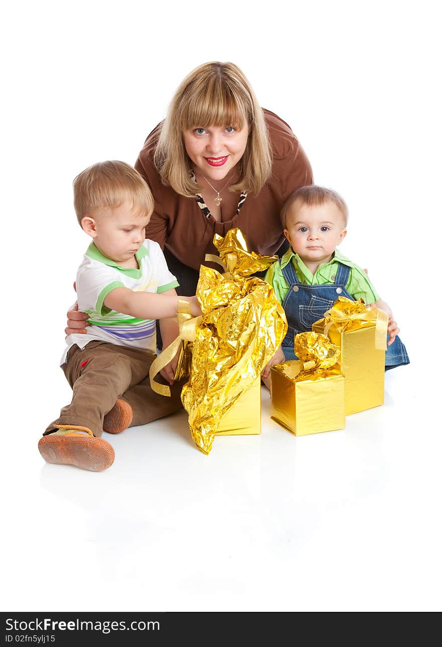 Two boys and mother with gifts. Isolated on white background