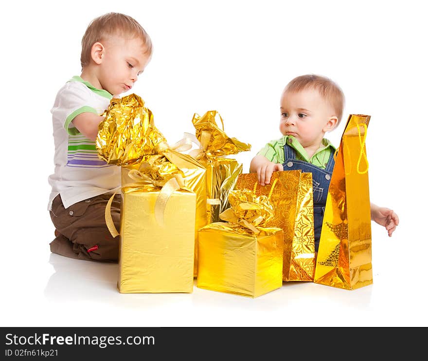 Two boys with gifts. Isolated on white background