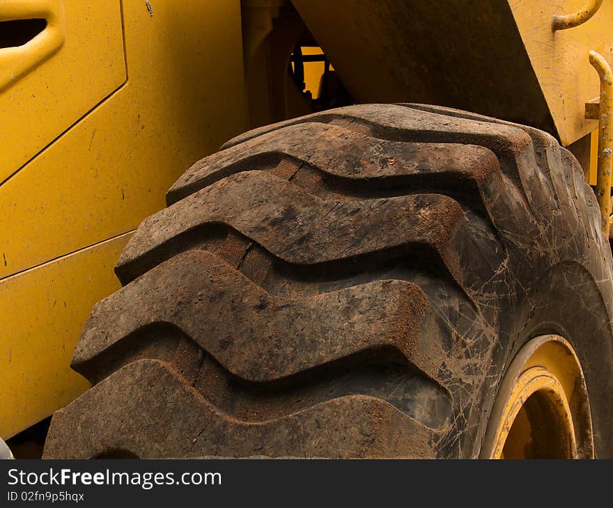 Part of a wheel of the heavy building mechanism of a loader. Part of a wheel of the heavy building mechanism of a loader