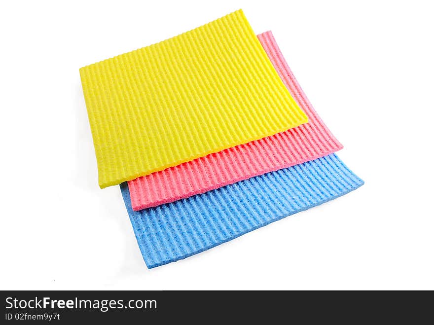 Three multi-coloured napkins isolated on a white background