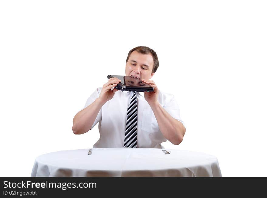 Businessman is eating notebook