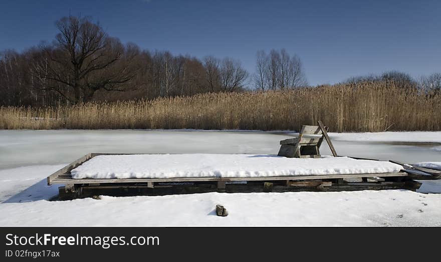 Ier with a pew wintertime on the lake, high density range image. Ier with a pew wintertime on the lake, high density range image