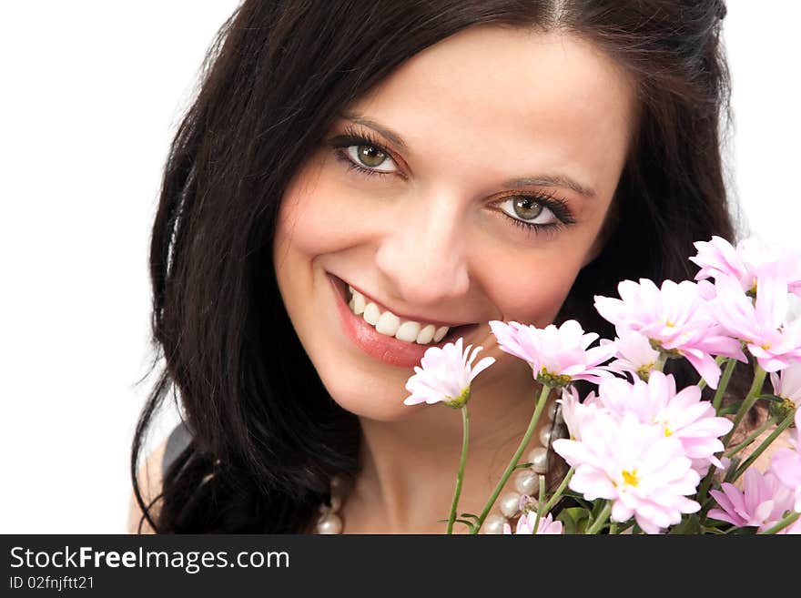 Beautiful young woman with a flower bouquet isolated on white. Beautiful young woman with a flower bouquet isolated on white