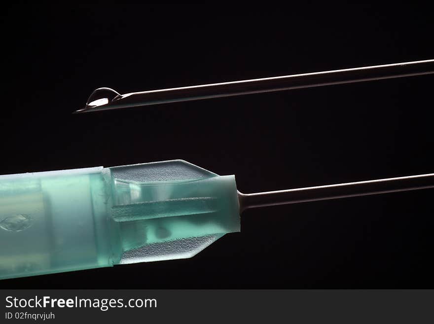 Syringe and needle.