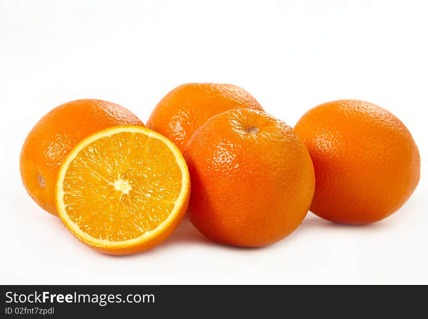 Fresh oranges on white background