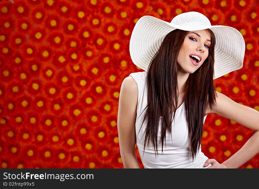 Woman over red flowers wall