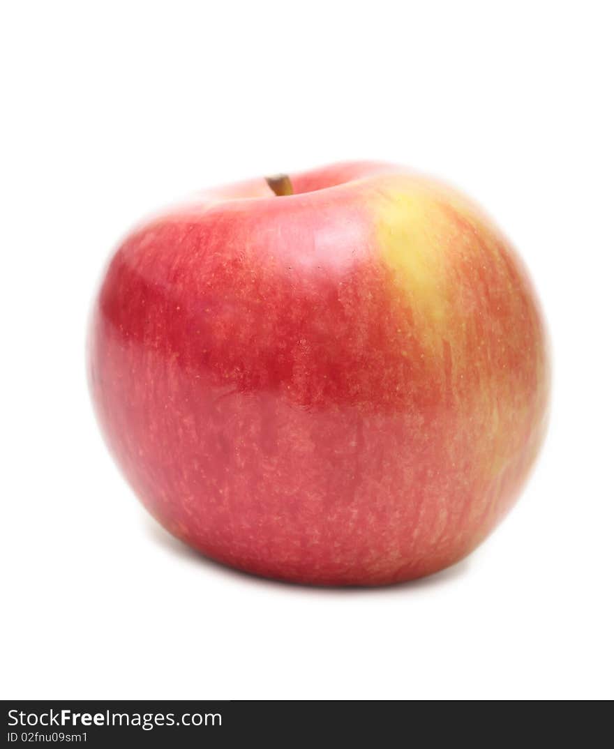 The red ripe apple, is isolated on a white background