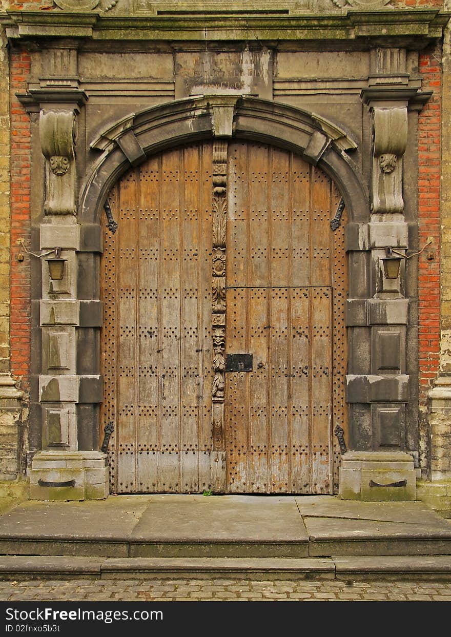 Closeup on brown front church doors