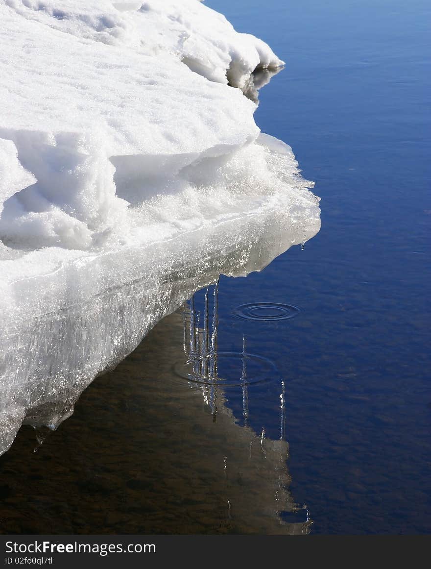 Icicles over water сlose up