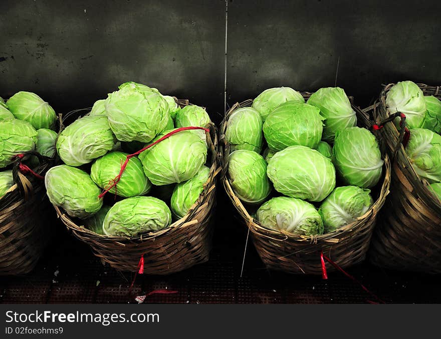 Cabbages in baskets at a Hong Kong indoor market, Wanchai.