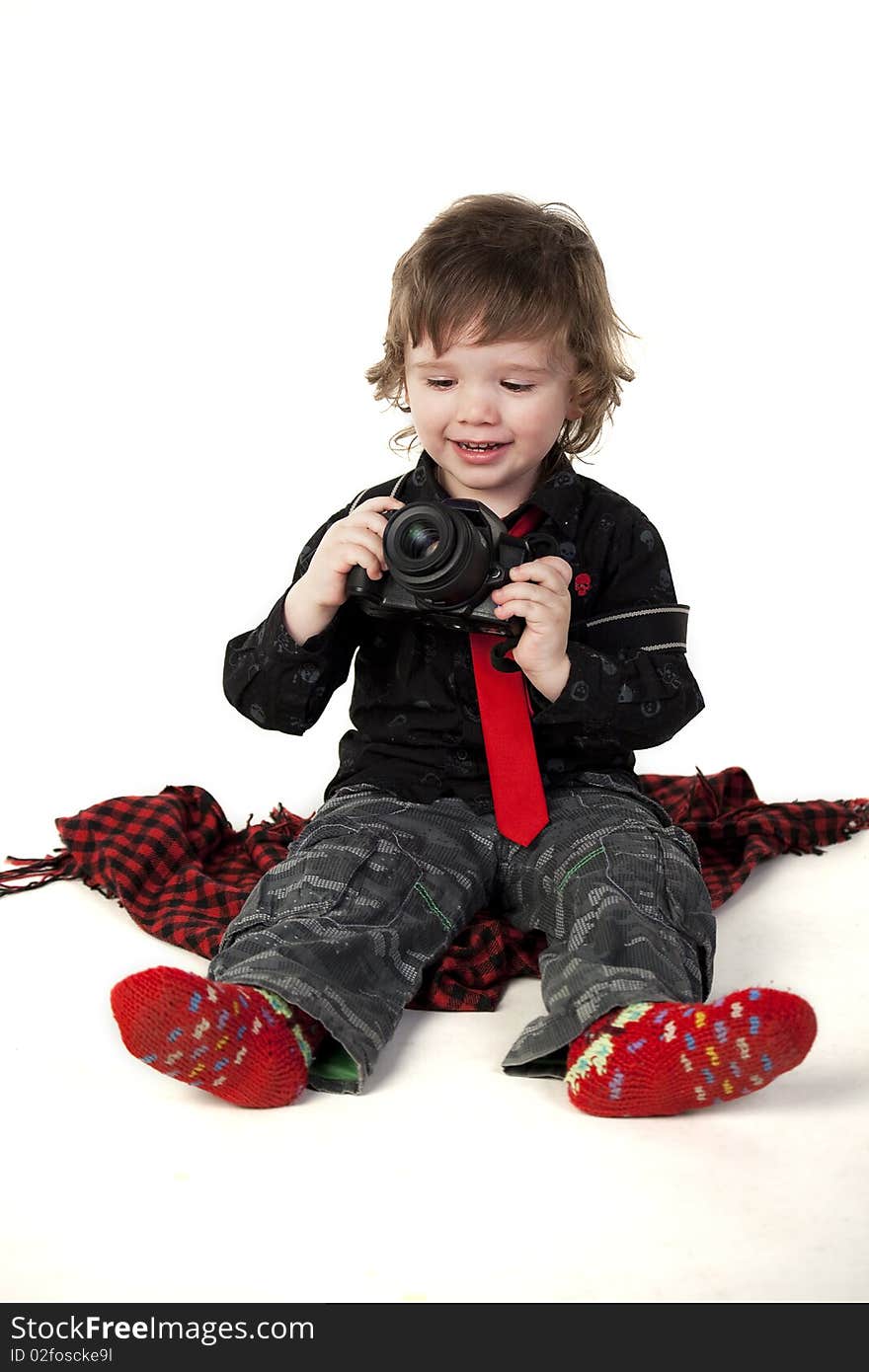 Little boy with camera