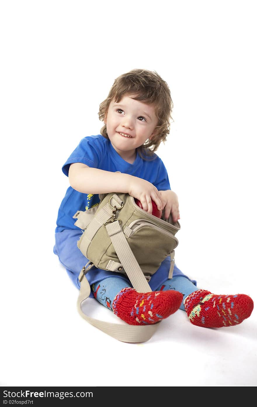 Cute child surprised with a bag. Cute child surprised with a bag