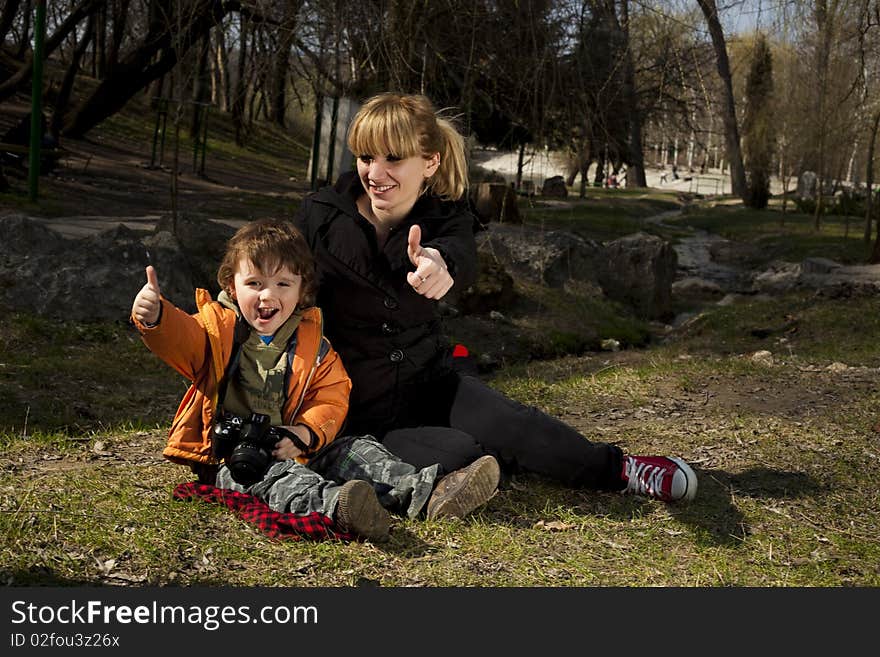 Cute child and his mother showing Thumbs up. Cute child and his mother showing Thumbs up