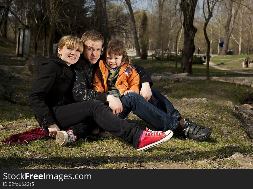 Mother father and there son smiling at camera. Mother father and there son smiling at camera