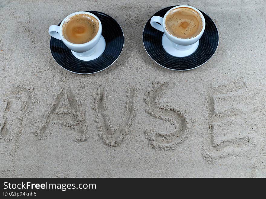 Break at the beach with two espresso cups. Break at the beach with two espresso cups