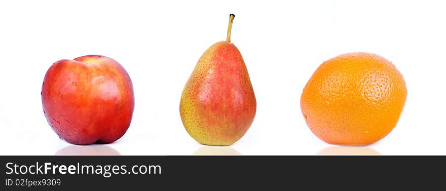 Peach, Pear And Orange Isolated On White