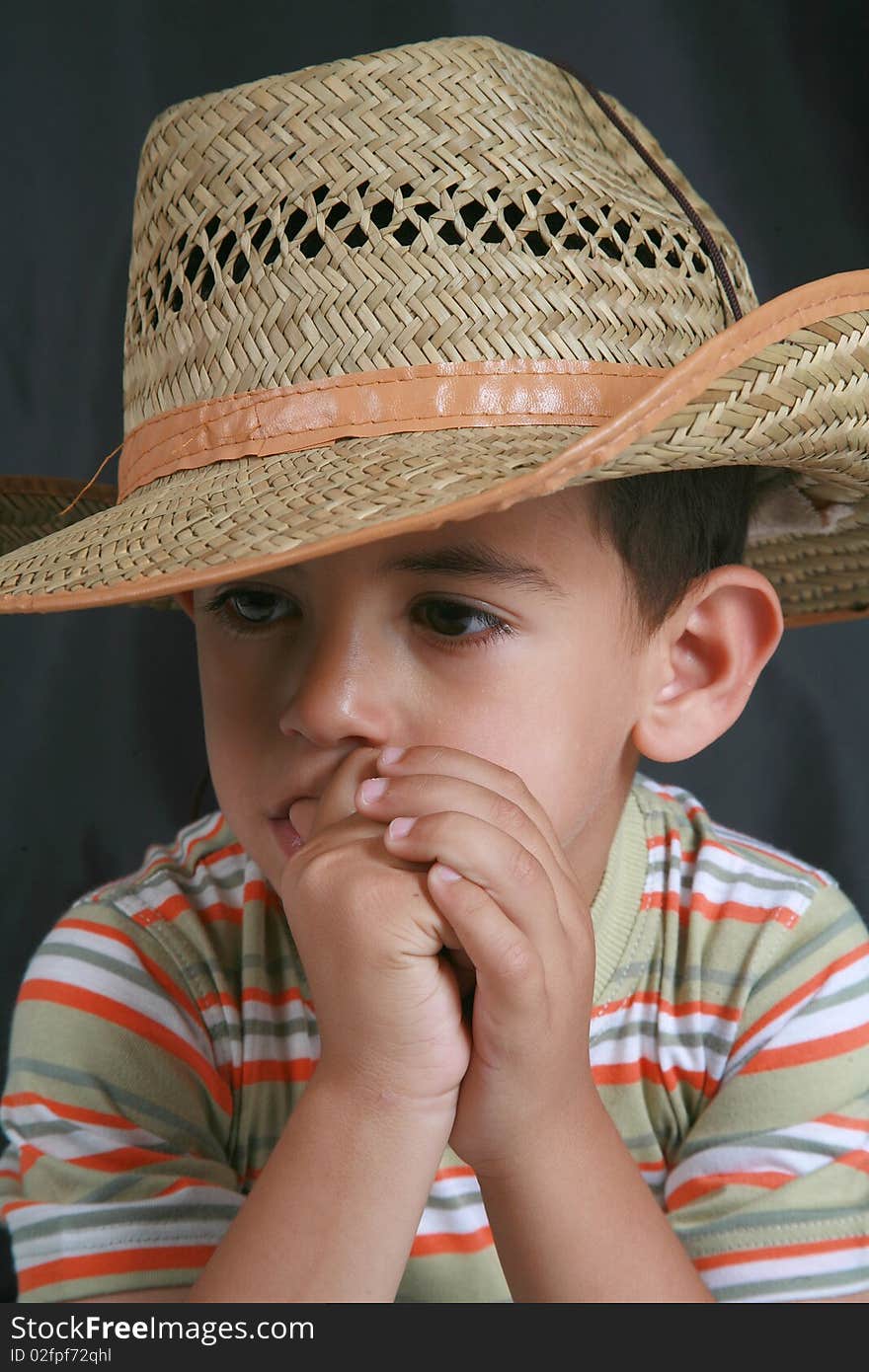 The image of a young child's cowboy hat. The image of a young child's cowboy hat