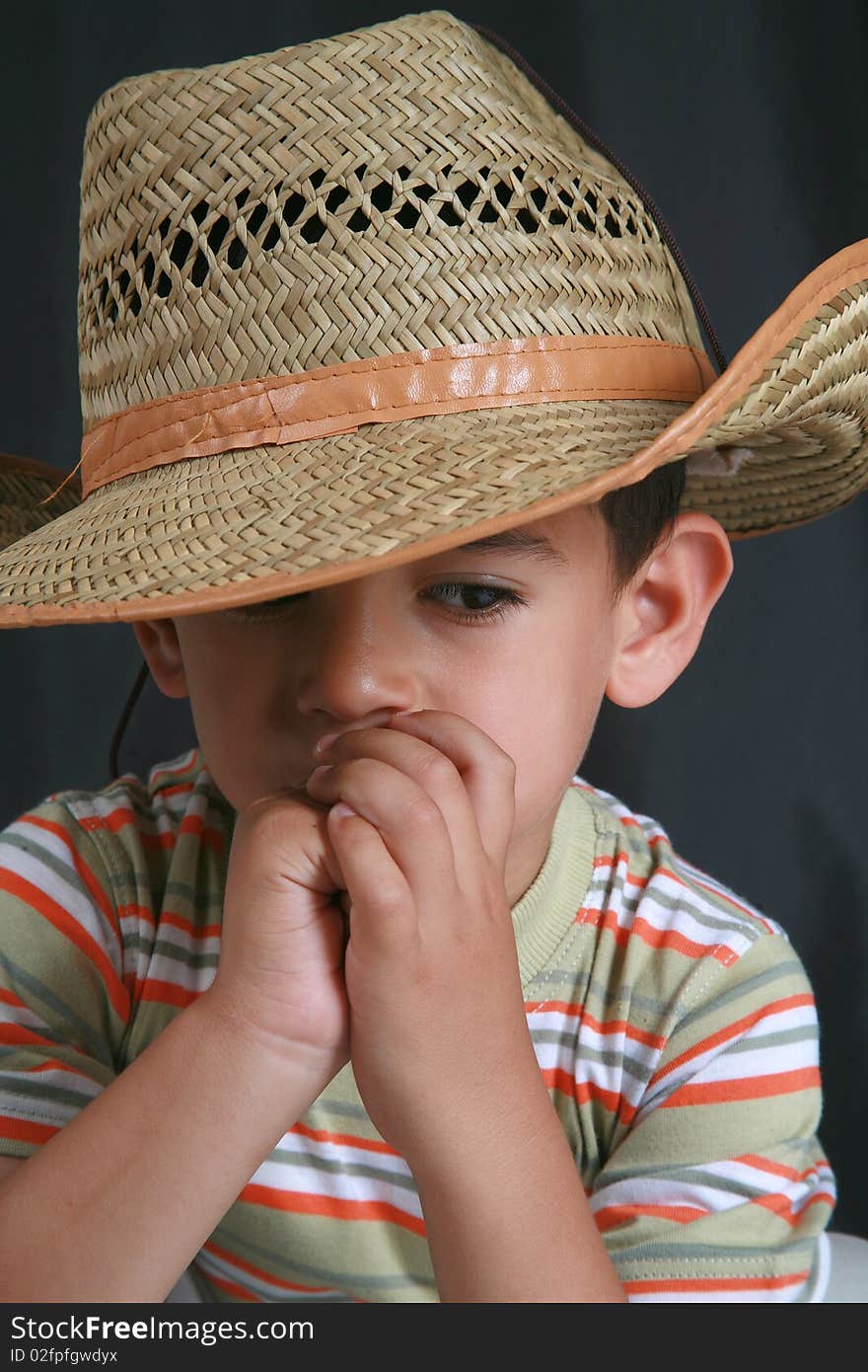 The image of a young child's cowboy hat. The image of a young child's cowboy hat