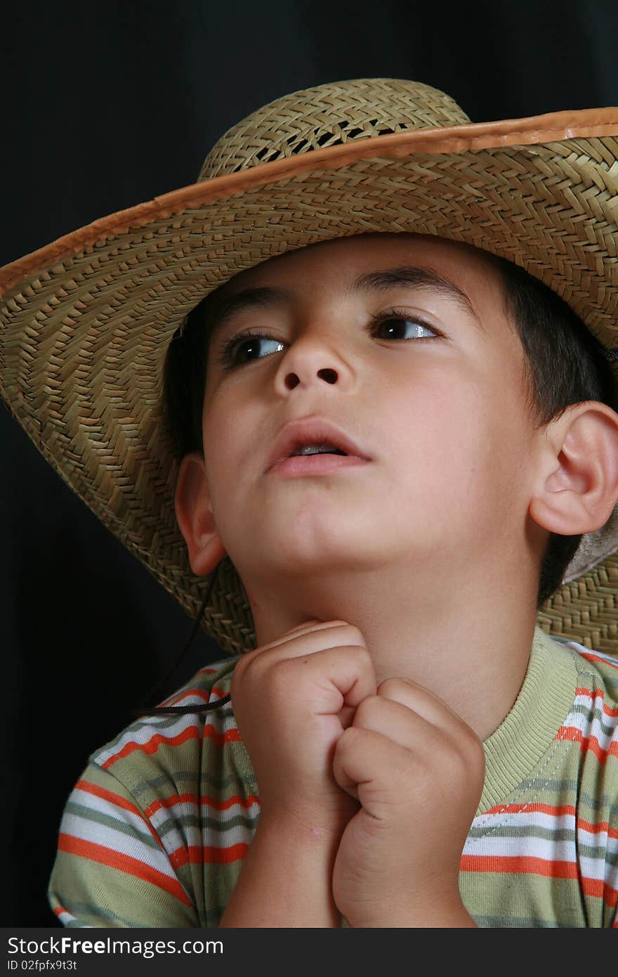 The image of a young child's cowboy hat. The image of a young child's cowboy hat