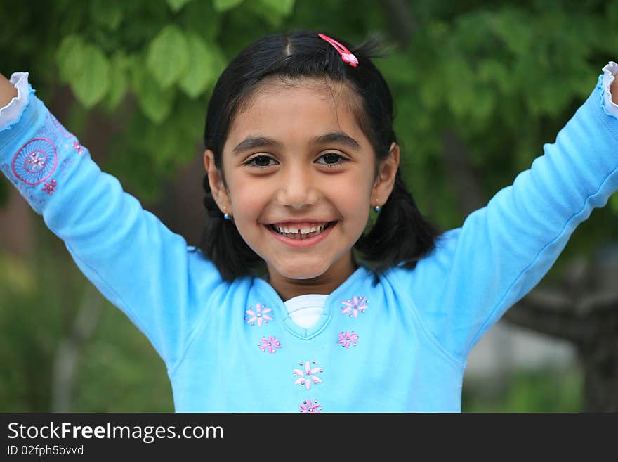 Cute little girl and flowers in his hand. Cute little girl and flowers in his hand