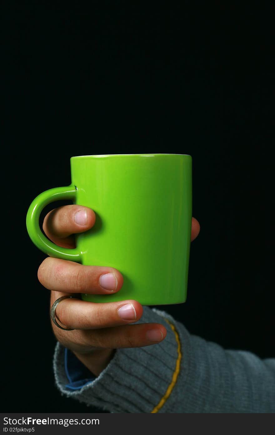 While the image of a charismatic man drinking tea. While the image of a charismatic man drinking tea