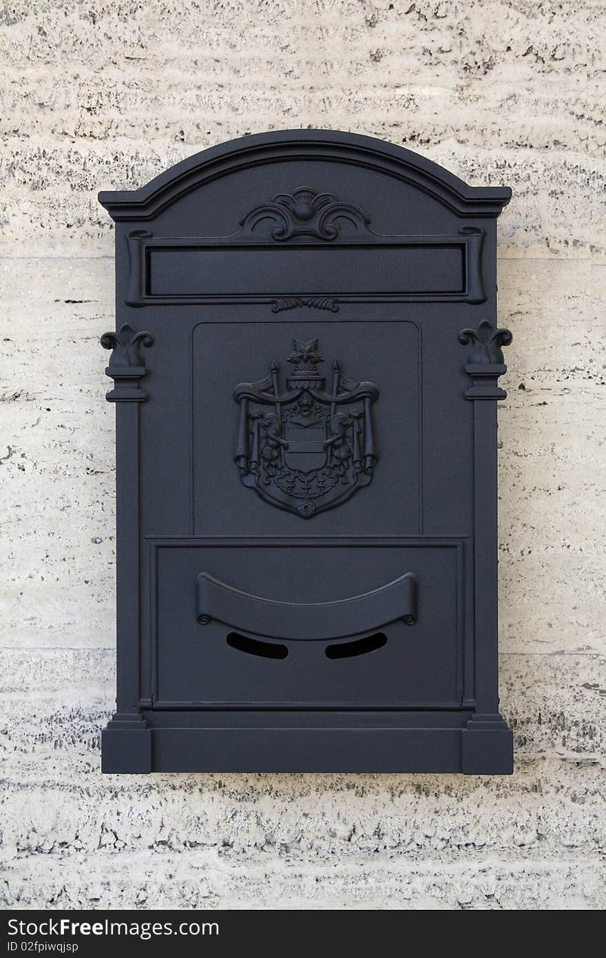 Black post office box on marble wall. Black post office box on marble wall