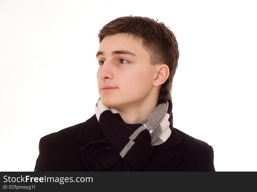 Young Man Standing On A White