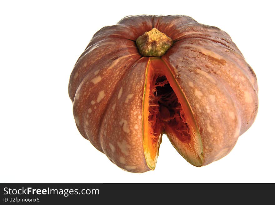 A cut pumpkin against a white background