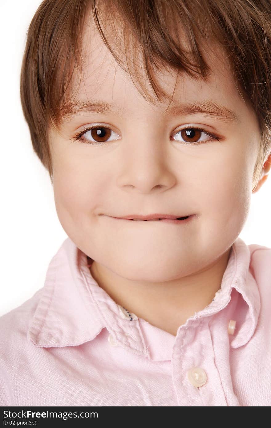 Portrait of ittle cute smiling boy in pink shirt on white background. Portrait of ittle cute smiling boy in pink shirt on white background