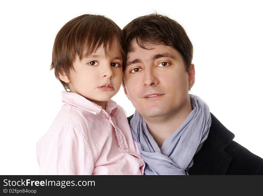 Cute little boy with young attractive father on white background. Cute little boy with young attractive father on white background