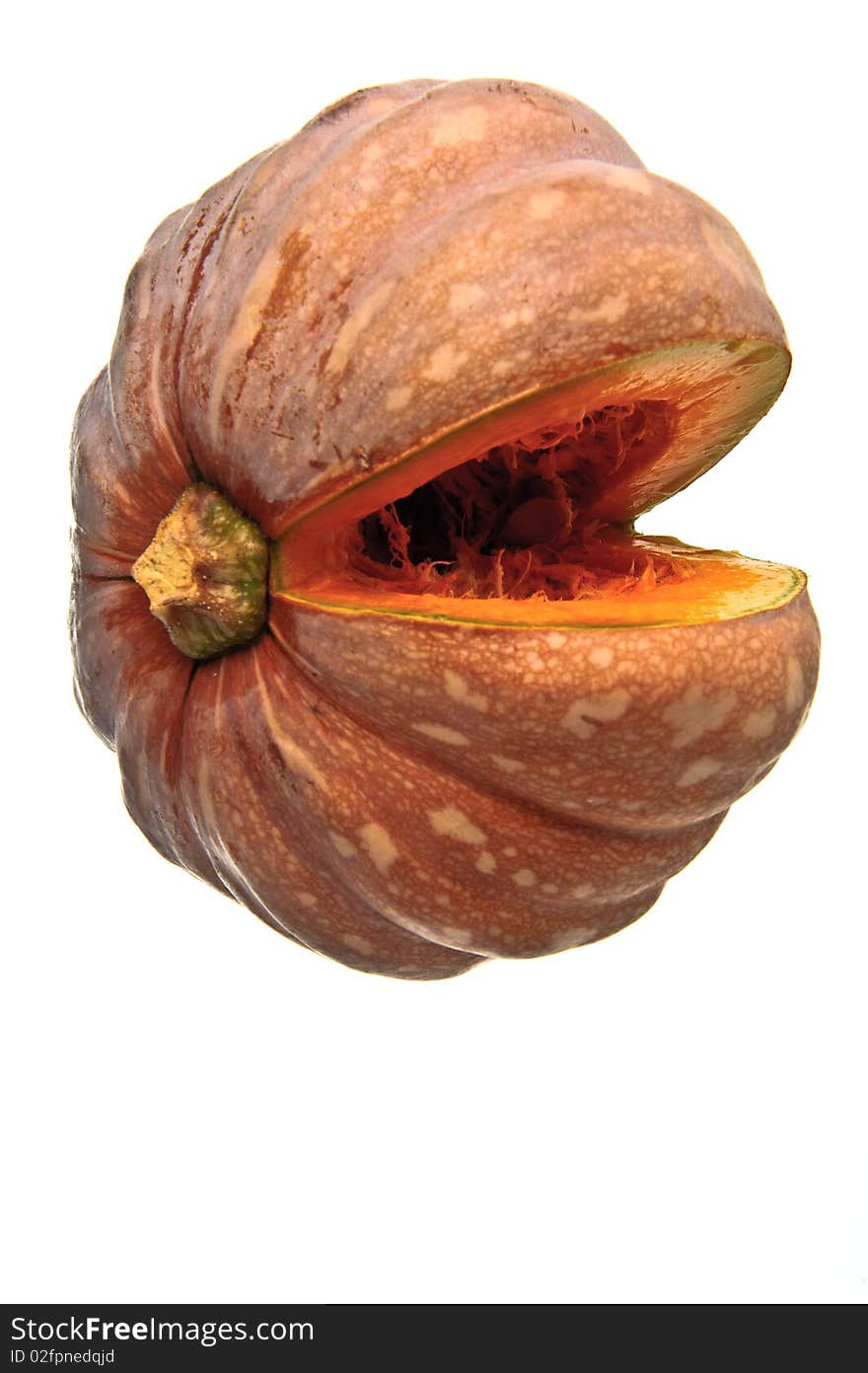 A cut pumpkin against a white background