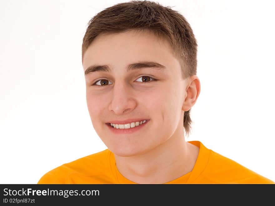 Handsome young man standing on a white background