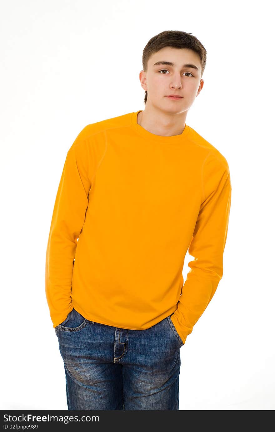 Beautiful young man standing on a white