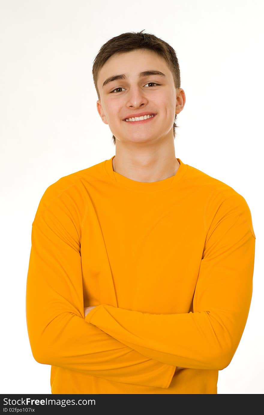 Beautiful young man standing on a white