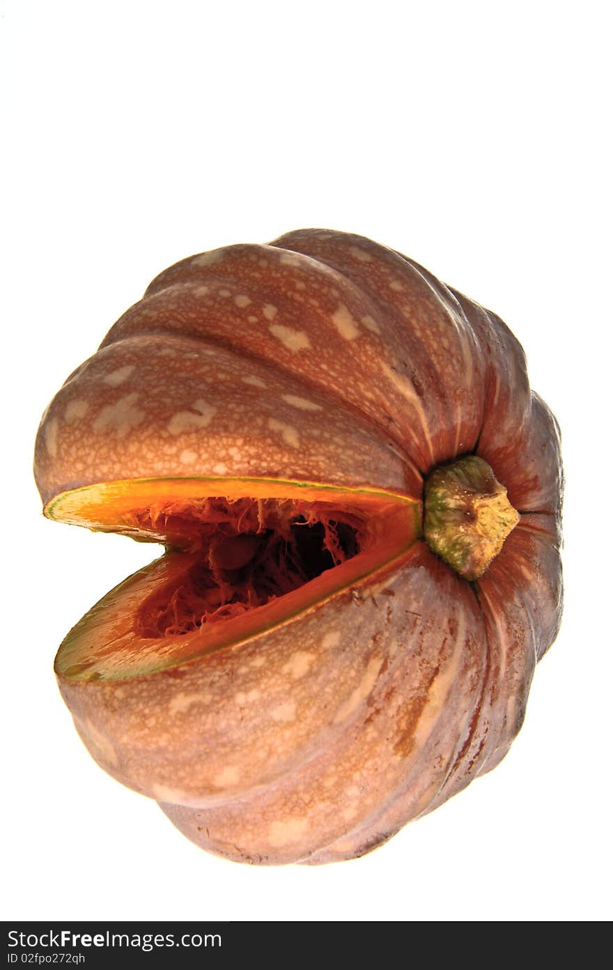 A cut pumpkin against a white background