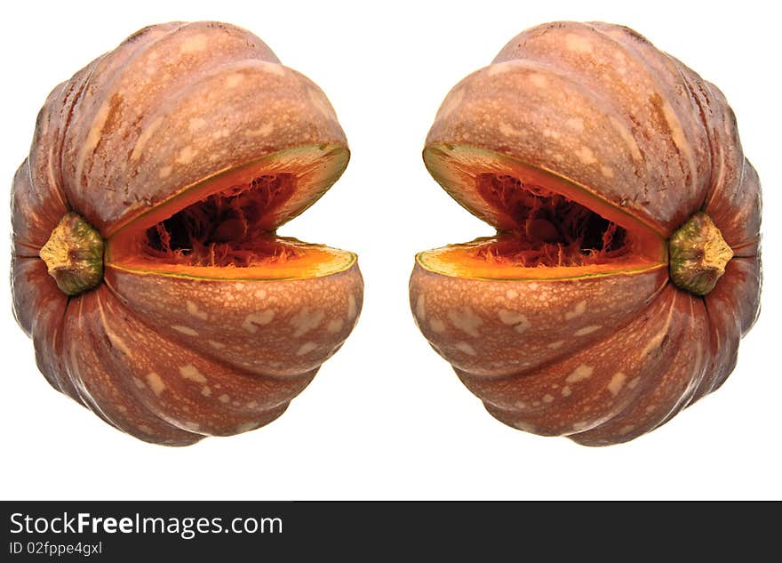 Two cut pumpkin against a white background