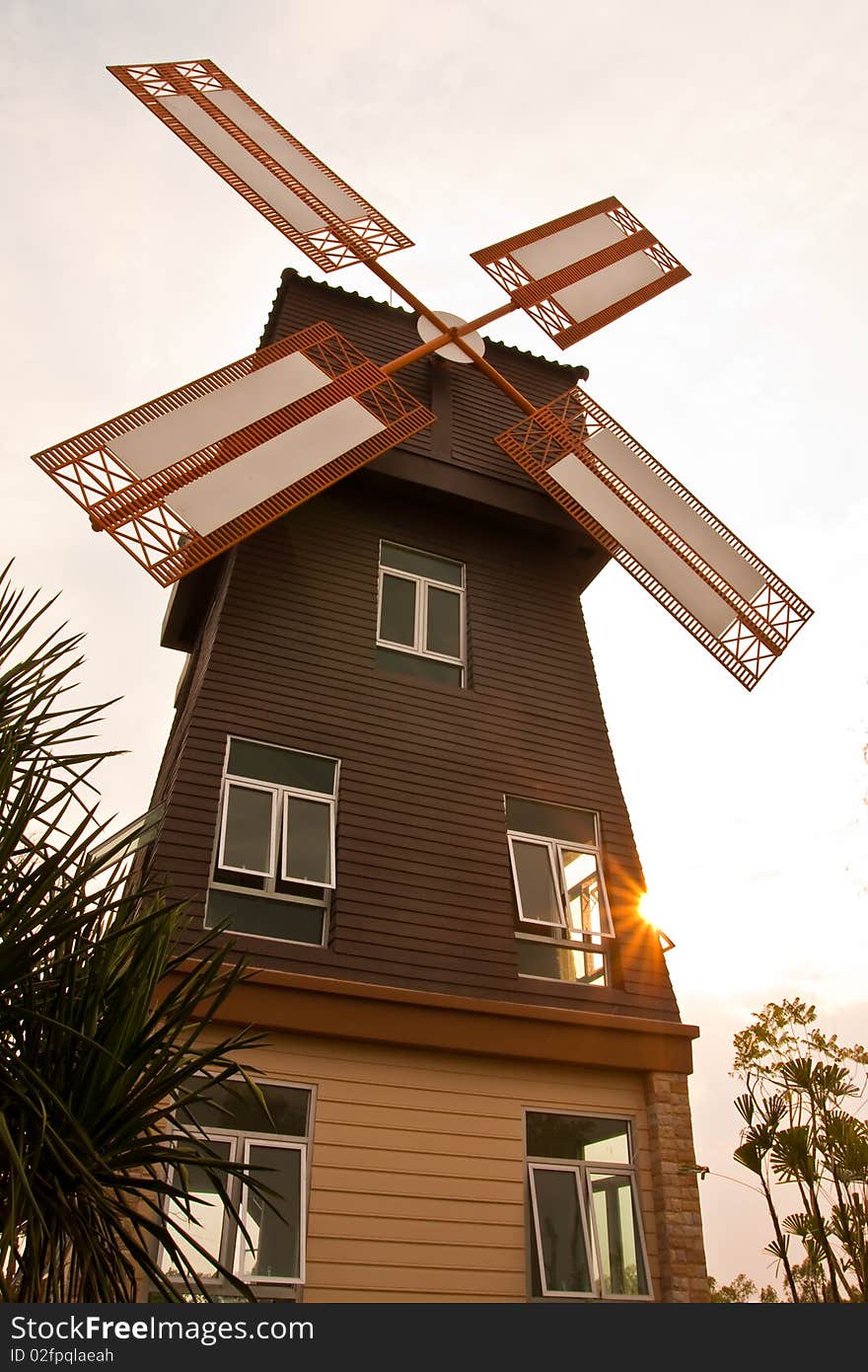 Wind mill and sun light