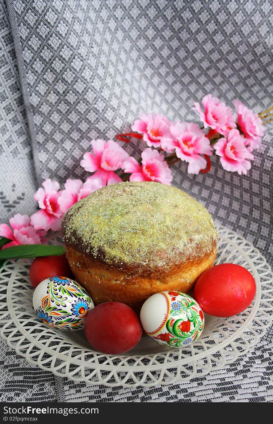 Traditional othodox easter pie with eggs on a ornamental cloth. Traditional othodox easter pie with eggs on a ornamental cloth